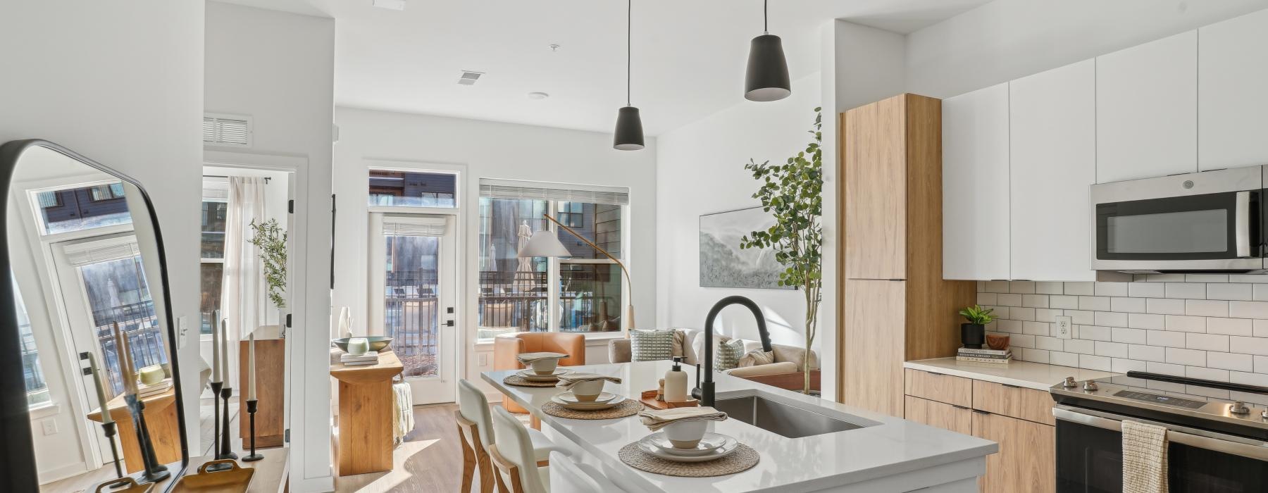 a kitchen with white cabinets