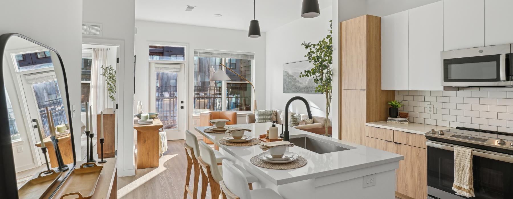 a kitchen with white cabinets