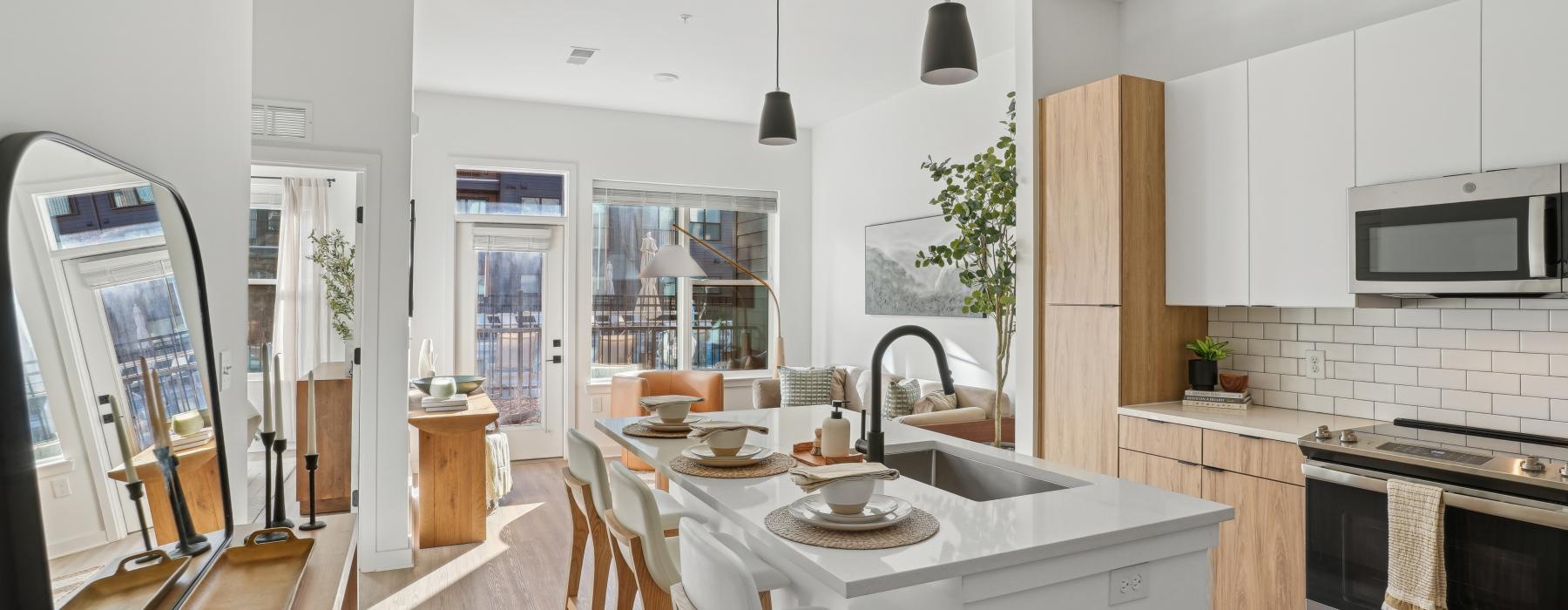 a kitchen with white cabinets